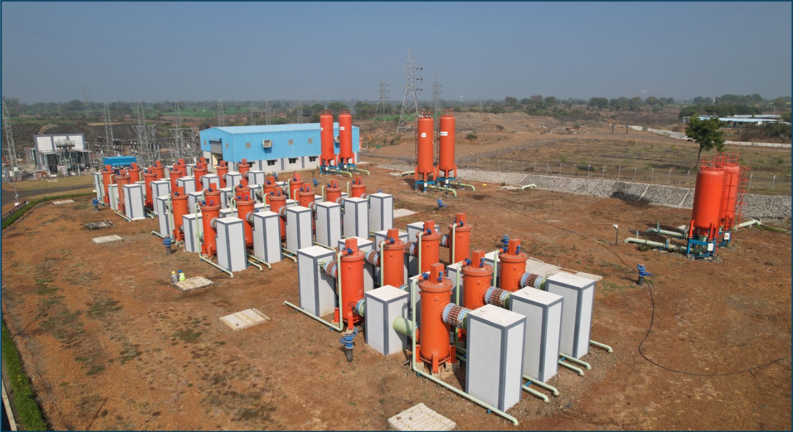 Row of SCADA-controlled pipeline outlet structures in the field